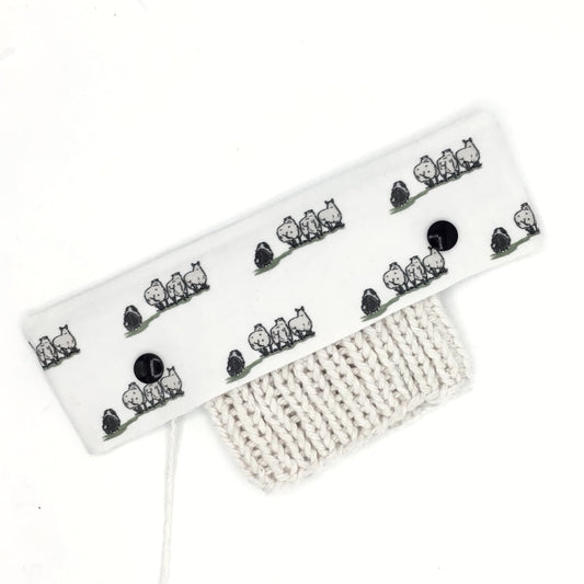 DPN (double pointed needle) holder for sock knitting with dog herding sheep design